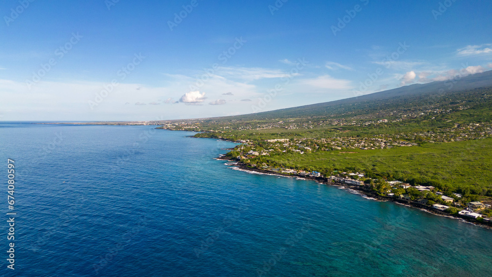 Fototapeta premium Drone photos off the the Big Island, Hawaii along the coast line with a beautiful blue sky and water