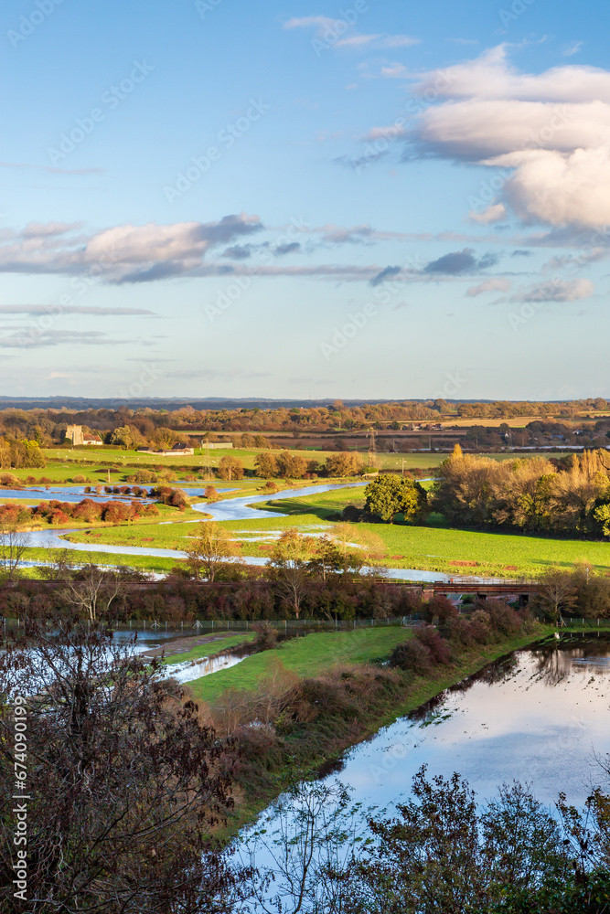 Looking out towards Hamsey church from near Lewes, with the fields flooded following recent heavy rainfall