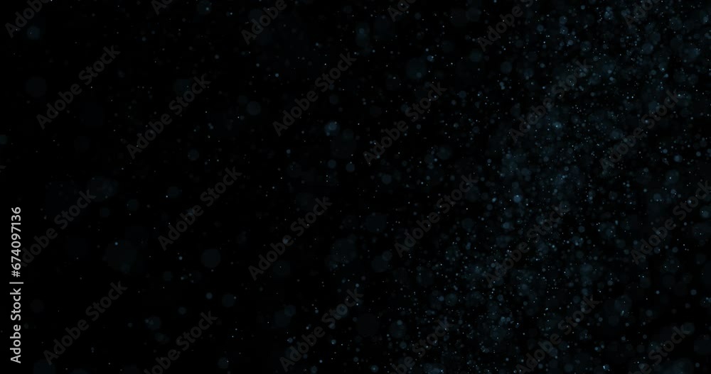 Magic loop cloud of dots random flying on black background.  Concept underwater bubbles. Seamless looping.