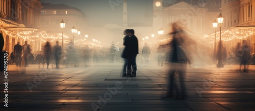 Silhouette of a couple in love against the backdrop of the bustle of the city. Long exposure. Motion blur. Relationship.