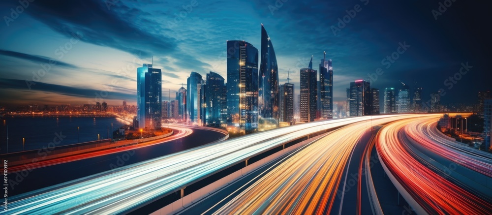 Fototapeta premium Streets of the metropolis at night. Motion blur. Abstract urban background.