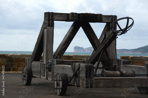 Catapult on seafront bastion in Alghero, Sardinia, Italy photo