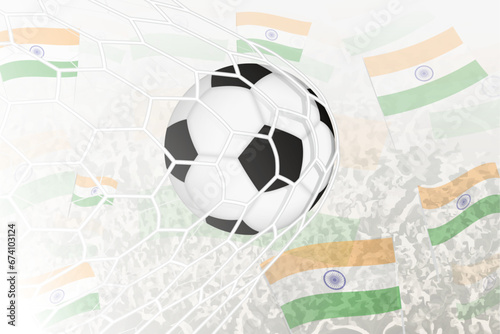 National Football team of India scored goal. Ball in goal net, while football supporters are waving the India flag in the background.