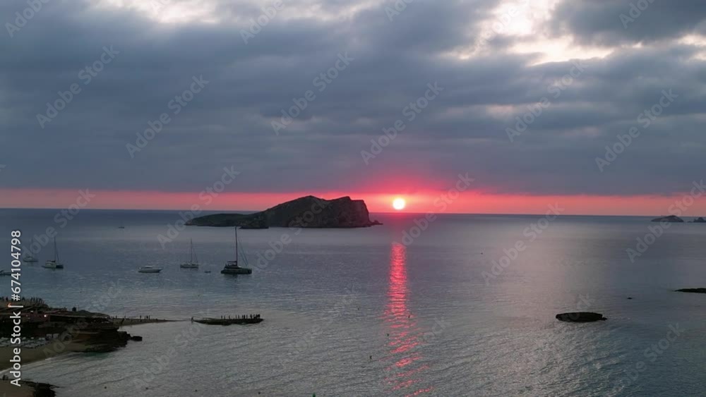 Stunning aerial view flight drone Cloudy sunset cliff beach Island Ibiza Spain Stunning aerial view flight drone Cloudy sunset cliff beach Island Ibiza Spain