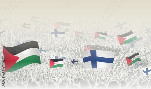 Palestine and Finland flags in a crowd of cheering people.