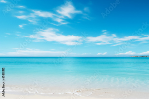 Picturesque sandy shore and gentle blue sea waves. This image can be used in the design of websites  brochures  postcards or other materials related to the theme of vacation and relaxation.