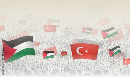 Palestine and Turkey flags in a crowd of cheering people.