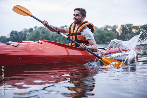 Man and kayak © georgerudy