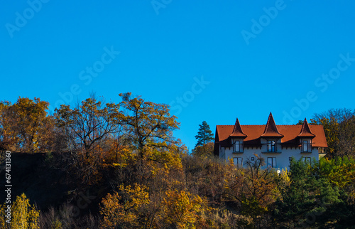 Landscape with a house among the trees in autumn © sebi_2569