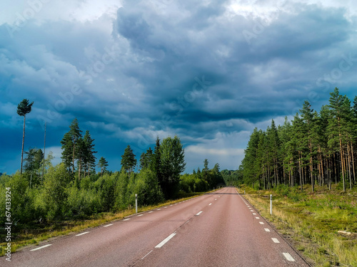 road in the forest , image taken in sweden, scandinavia, , europe © underworld