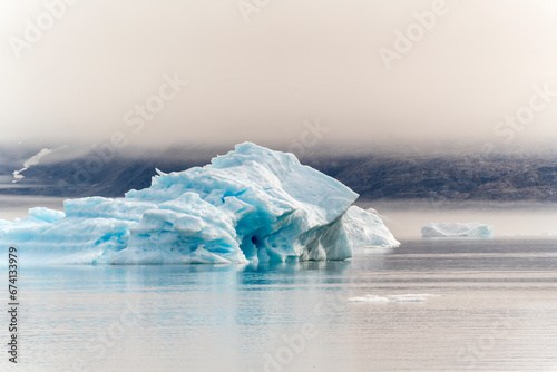 iceberg in polar regions foggy sky