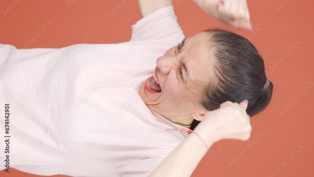 Vertical video of Woman exploding with anger. Vertical video of Woman exploding with anger.