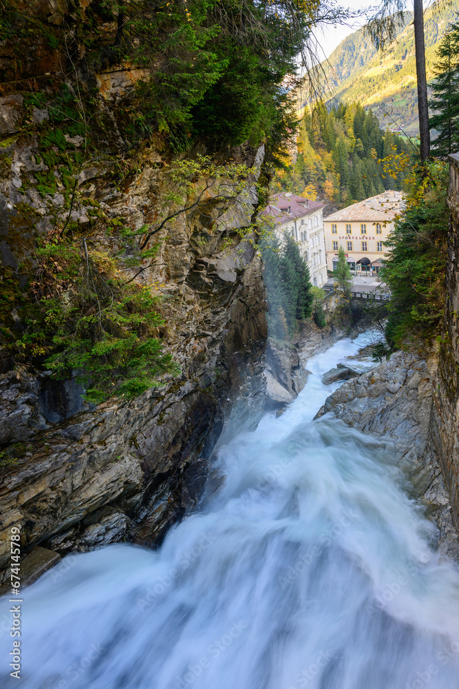 waterfall in autumn in bad gastein in the austrian alps waterfall in autumn in bad gastein in the austrian alps