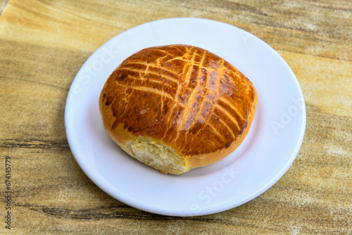 Turkish pastry product , tasty pogaca. Turkish Pastries; pogaca, borek, acma, ay coregi at patisserie showcase. photo