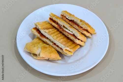 Turkish karisik atom  tost ( kasarli bazlama tost) . Sucuklu, Kasarli, kavurmali karisik tost. Flat baked bread toasted