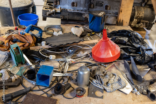 Принти на полотні Clutter in a car repair garage