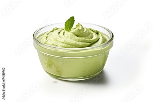 small bowl with pistachio paste isolated on transparent or white background photo