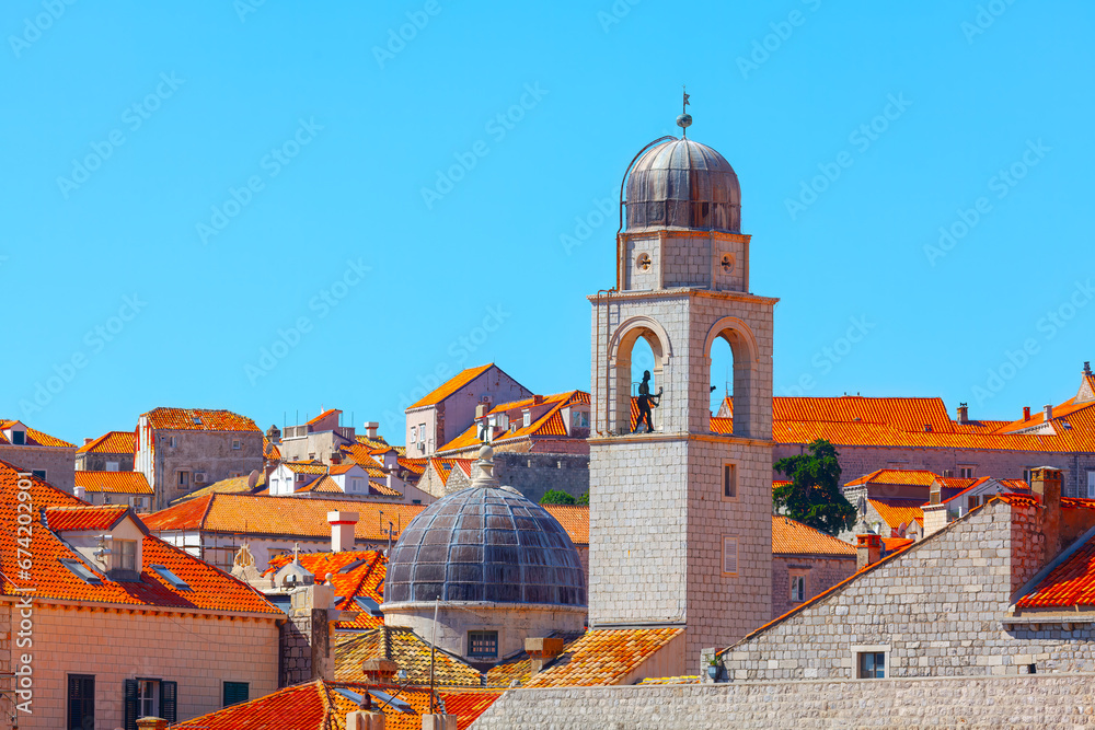 Enchanting view capturing the essence of Dubrovnik, where the prominent bell tower gracefully pierces the azure sky