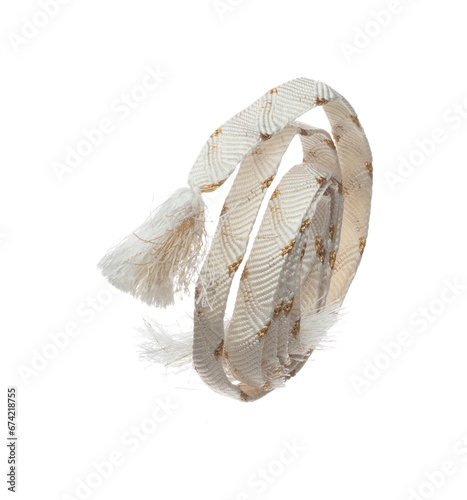 String rope obi Japanese Traditional Komono equipment fly in air with curve. String rope obi Japanese Traditional Komono fabric is beautiful clothes for ceremony event. White background isolated