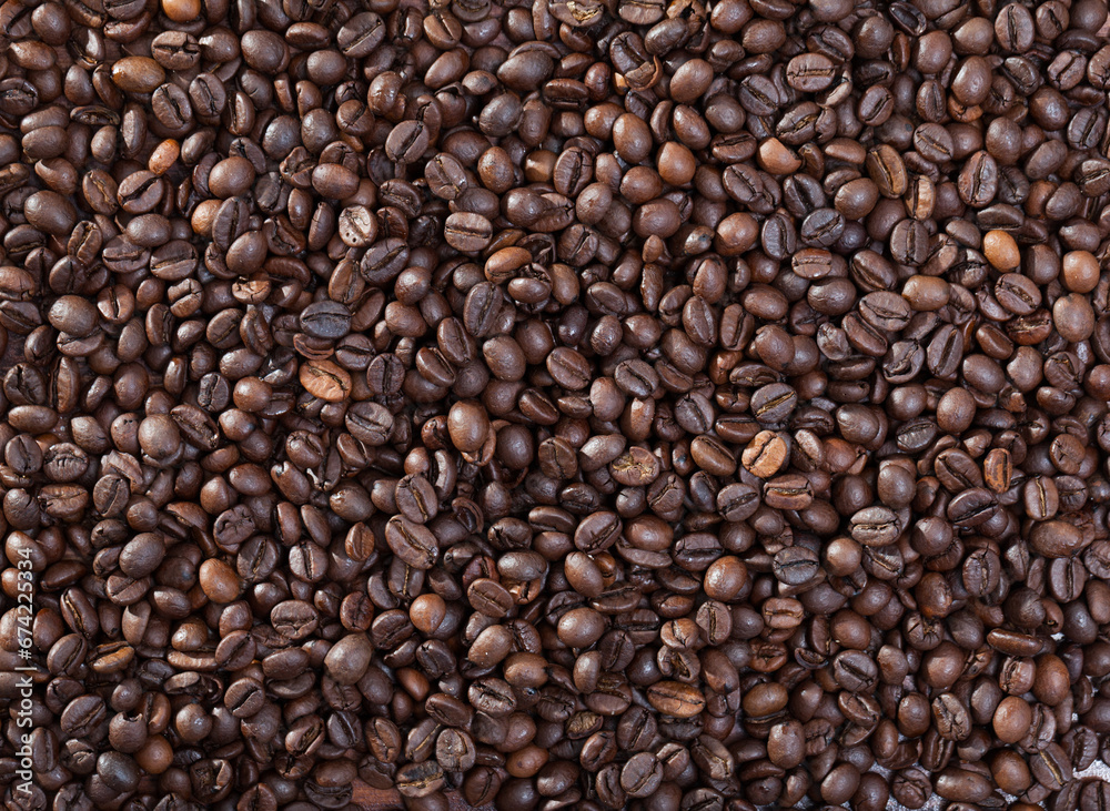 Fototapeta premium Roasted coffee beans background. High quality photo