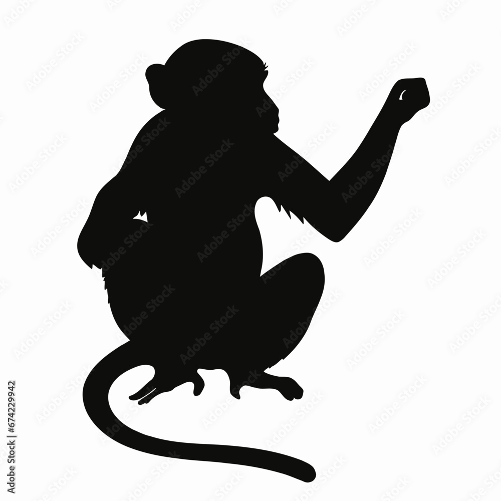 Obraz premium Vector Silhouette of Monkey, Playful Monkey Illustration for Jungle and Nature Themes