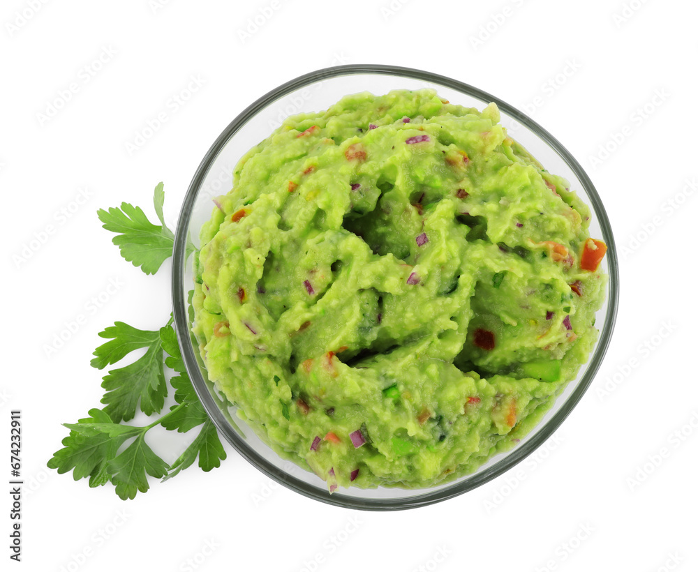 Bowl of delicious guacamole with parsley isolated on white, top view Bowl of delicious guacamole with parsley isolated on white, top view