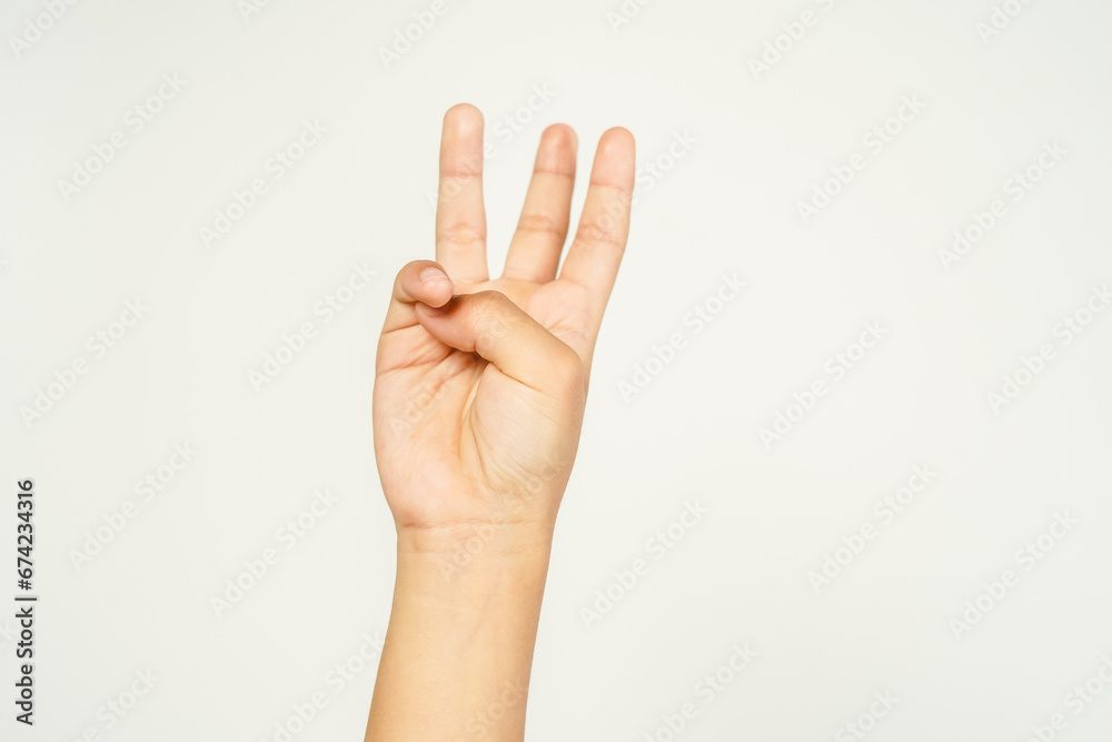 Pointing up with finger number three, Close up, isolated on white background. Pointing up with finger number three, Close up, isolated on white background.