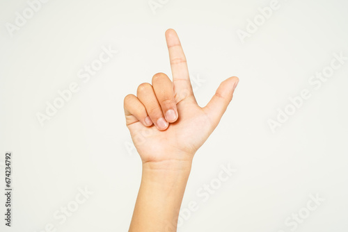 child hand pointing with two fingers  hand showing peace sign isolated on white background