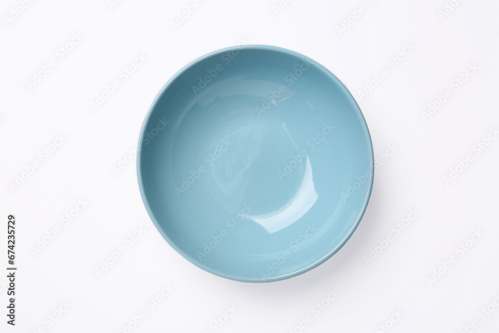 One clean plate on white background, top view. Ceramic dinnerware One clean plate on white background, top view. Ceramic dinnerware