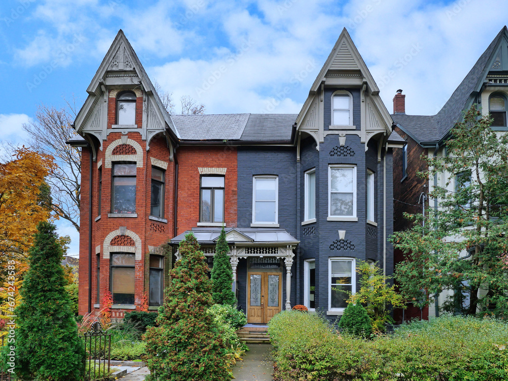 Old narrow Victorian semi-detached houses with gables Old narrow Victorian semi-detached houses with gables