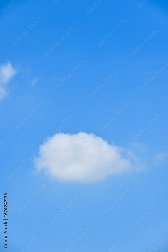 beautiful blue sky and white fluffy single cloud with sunrise in the morning, natural background beautiful blue sky and white fluffy single cloud with sunrise in the morning, natural background