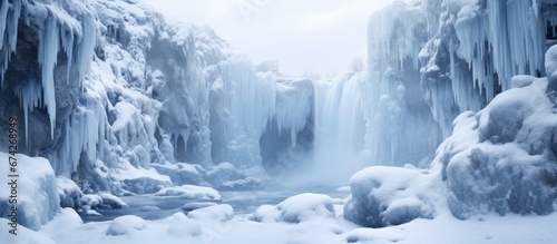 A frozen waterfall during the winter that is not completely solidified