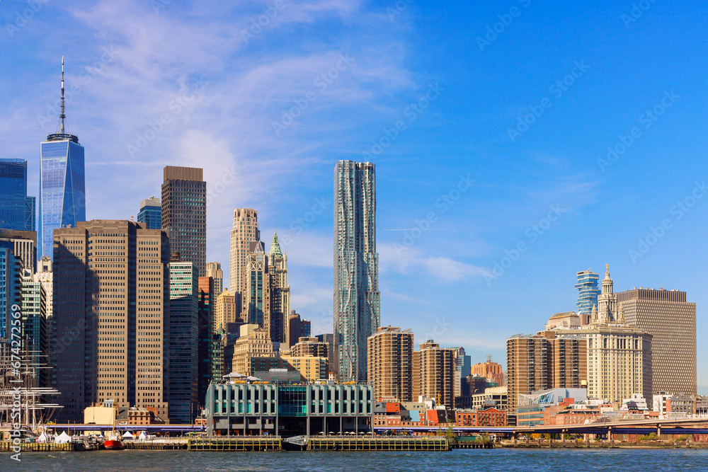 On sunny day Lower Manhattans panoramic skyline offers stunning view of cityscape NYC