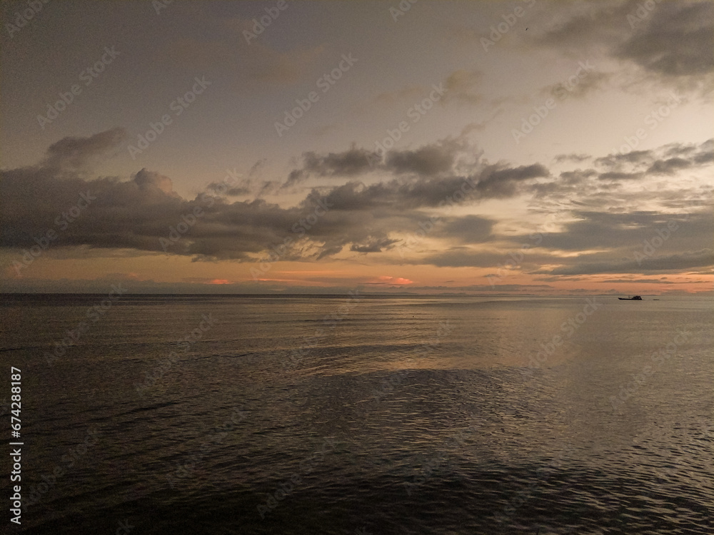 Obraz premium sunset over the sea in Biak Papua
