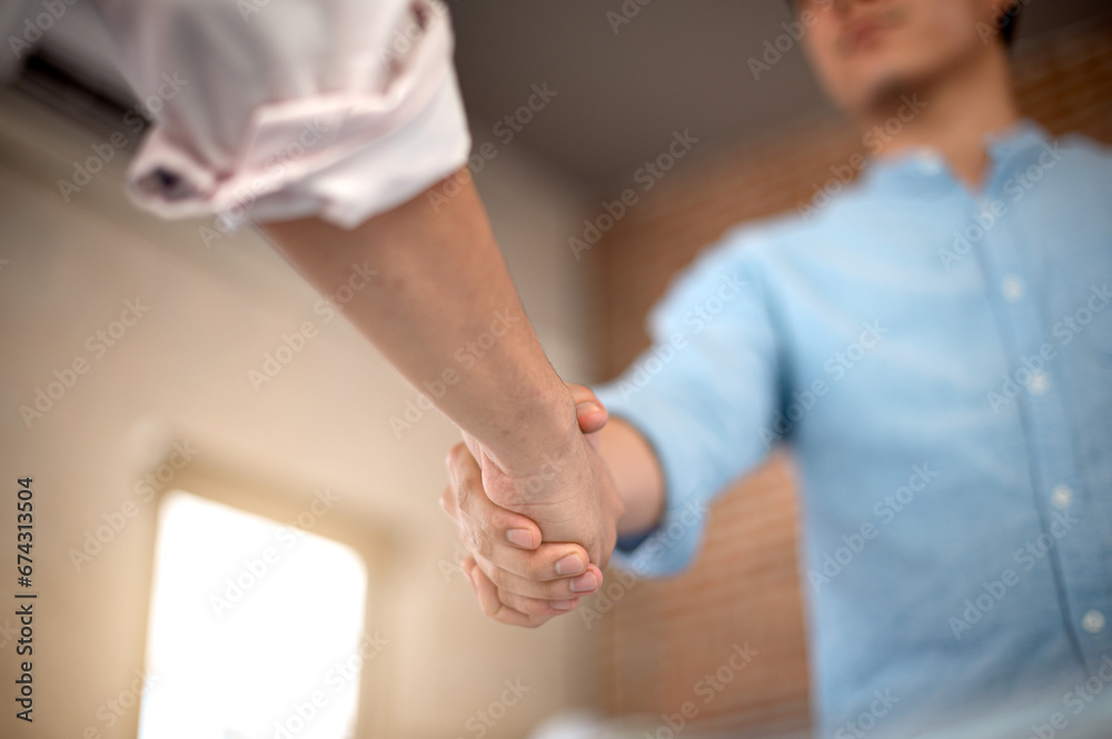 Architect worker team hand shaking after successful consultation meeting agreement plan new project contract in office at construction site, teamwork, partnership and contractor concept with client Architect worker team hand shaking after successful consultation meeting agreement plan new project contract in office at construction site, teamwork, partnership and contractor concept with client