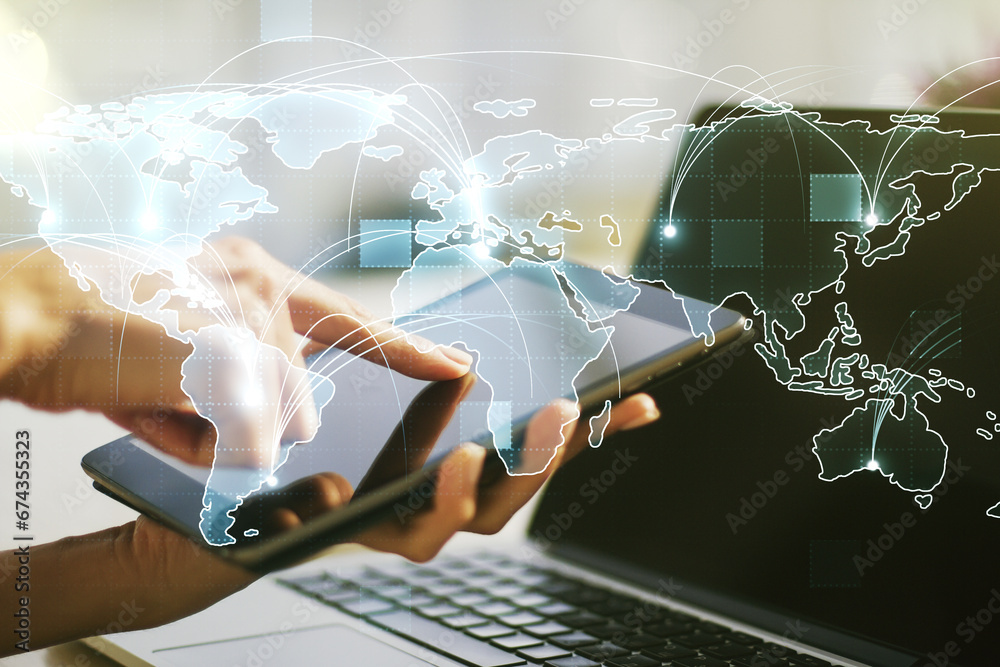 Abstract graphic digital world map with connections and finger presses on a digital tablet on background, globalization concept. Multiexposure Abstract graphic digital world map with connections and finger presses on a digital tablet on background, globalization concept. Multiexposure