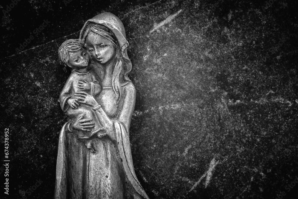 Virgin Mary with the baby Jesus Christ. Religion, faith, eternal life, God, the soul concept. Copy space. Black and white image.