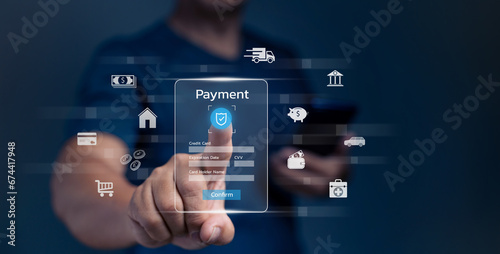 Digital banking network, internet payment, financial technology or FinTech concept. Businessman using smartphone with icons on virtual screen, online shopping and payment via mobile banking apps