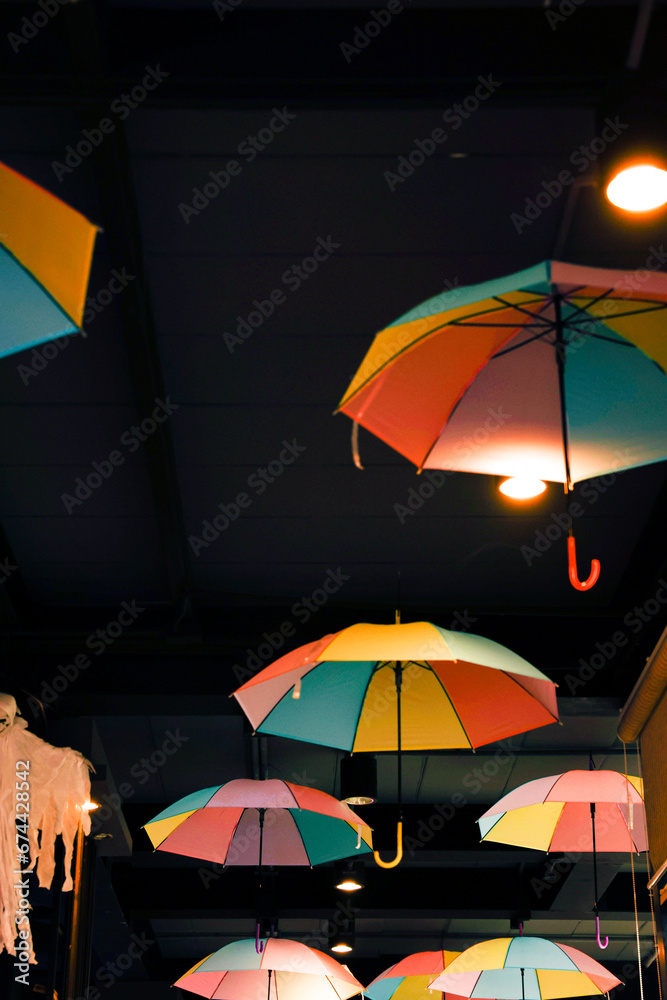 Ceiling of hanging colourful umbrellas