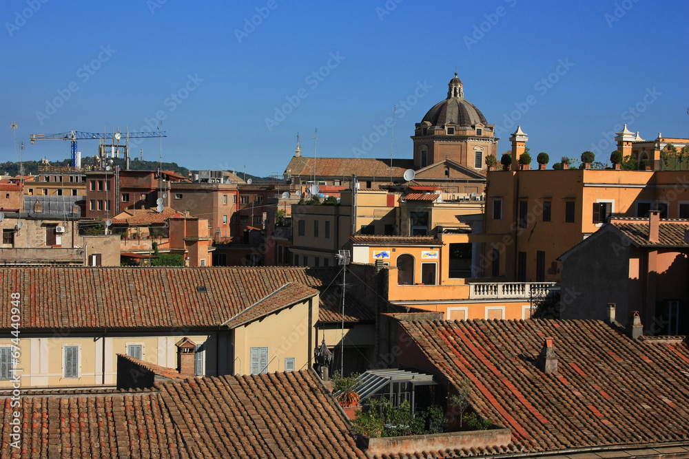 Rome cityscape with old houses and blue sky. Italy.