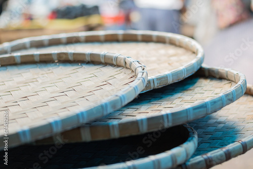 Trays made of bamboo cane are being sold in market as an eco-friendly and bio degradable alternative to plastic. These trays are extensively used in hilly tribal areas of India. photo