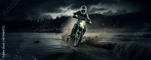 Motocross rider on a motorcycle in forest trail with splashing water, Extreme sports in action motion blur photo