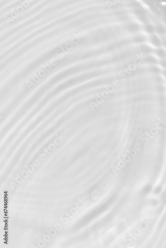 Defocus blurred transparent white colored clear calm water surface texture with splashes reflection. Trendy abstract nature background. Water waves in sunlight with copy space. Blue watercolor shine.