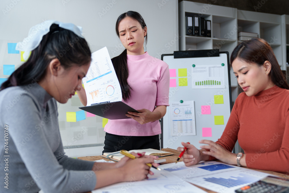 A team of female office workers is stressed over finding solutions to problems in meeting documents. The head of the organization blames the work for being unsuccessful. Discussion concept improvement A team of female office workers is stressed over finding solutions to problems in meeting documents. The head of the organization blames the work for being unsuccessful. Discussion concept improvement