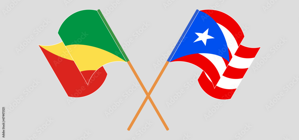 Crossed and waving flags of Republic of the Congo and Puerto Rico
