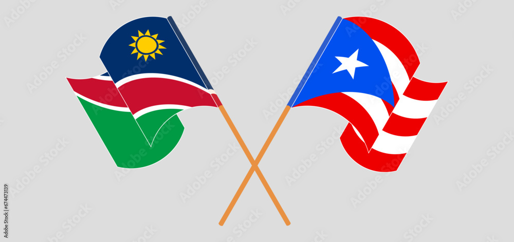 Crossed and waving flags of Namibia and Puerto Rico