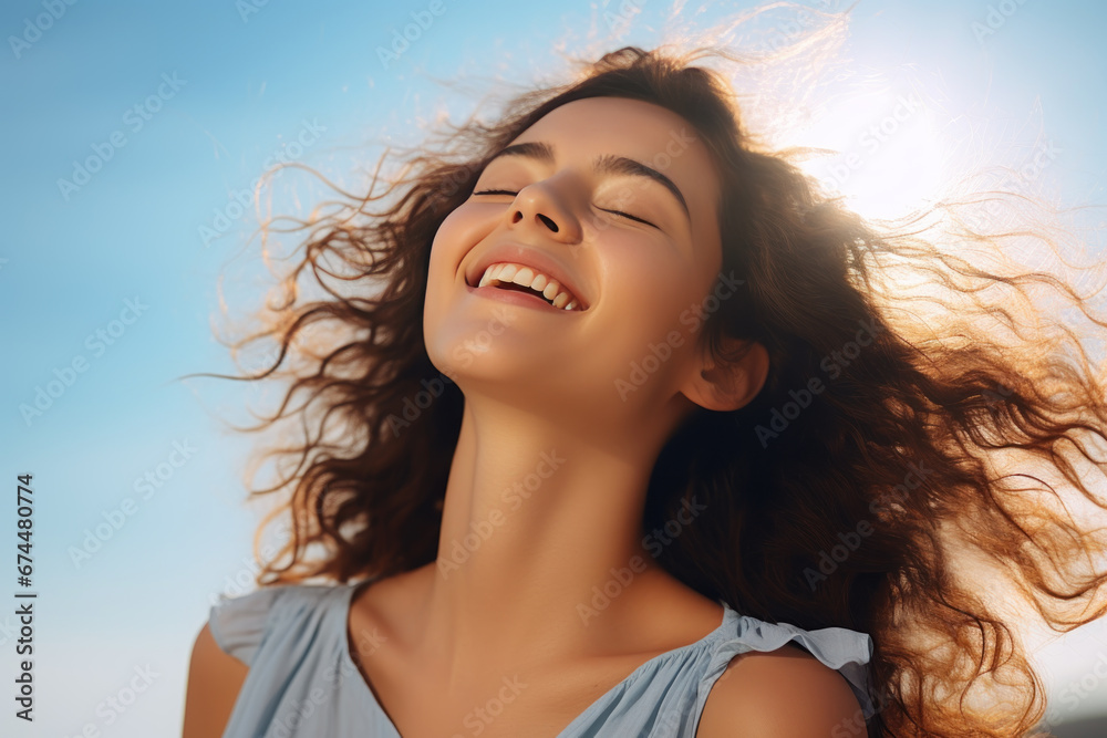 A brunette woman breathes calmly looking up enjoying summer season A brunette woman breathes calmly looking up enjoying summer season