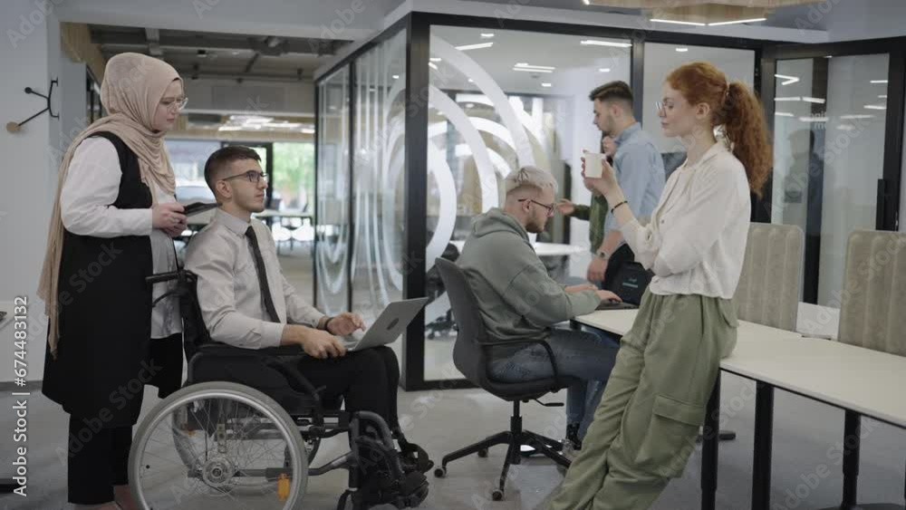 Group of business people brainstorming together in a startup space, discussing business projects, investments, and solving challenges. Group of business people brainstorming together in a startup space, discussing business projects, investments, and solving challenges.