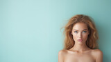 Serious naked fashion young woman Caucasian blonde model on a blue banner with copy space