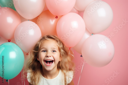 Happy blonde little girl excited looking up in the balloons © Aris